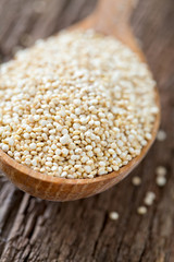 organic quinoa on old background