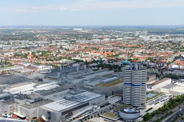 Aerial view of Munich with the BMW Museum and headquarters from the 291 m high Olympic tower (Olympiaturm).
