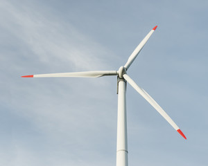 Alternative sources of energy. Windmills against the blue sky