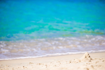 Fototapeta na wymiar Turquiose water and white sand on one of the european beaches
