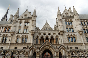 Historical building and entrance of Royal Courts of Justice in London England