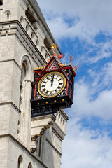 Fototapeta na wymiar Clock at Royal Court of Justice, London, UK.