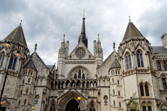 Historical building and entrance of Royal Courts of Justice in London England