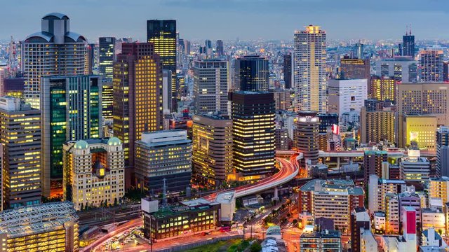 Osaka, Japan Umeda District skyline time lapse.