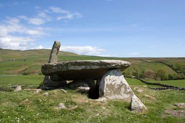 Cairn Holy Chambered Cairn, near Wigtown - Dumfries and Galloway. Neolithic burial chamber in Scotland. Bright sunny day, blue sky.