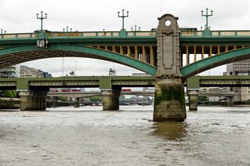 View of Bridges Along the Thames River in London, England. Cannon Street Railway Bridge, London Bridge, Tower Bridge.