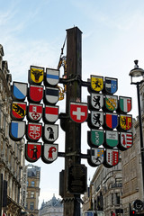View of Swiss Cantonal Tree (erected 1991) on Leicester Square. This Cantonal Tree displays coats of arms of twenty-six cantons of Switzerland.