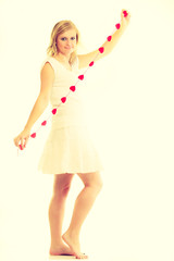 Girl with little red hearts.