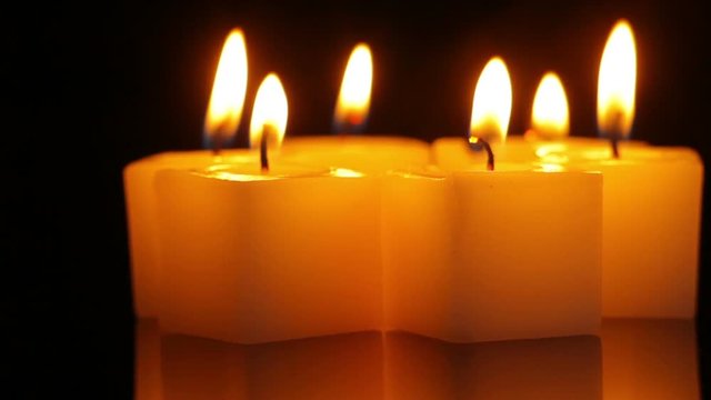 candle revolve symbolic in the dark