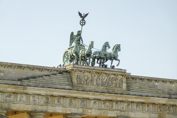 Naklejka premium Quadriga statue on famous Brandenburg gate in Berlin - Brandenburger Tor