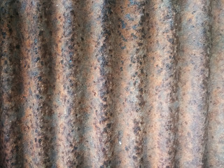 closeup shot of old and rusty corrugated galvanized iron texture