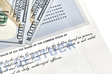 Stock Certificate Shares with US One Hundred Dollar Bills