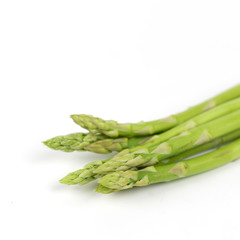 fresh asparagus on white background
