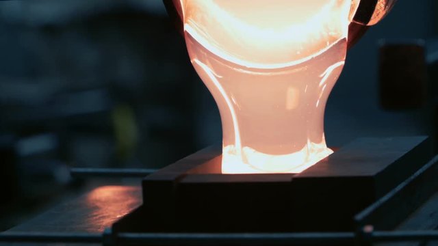 Blowing Glass - Glass casting into a graphite mold