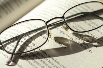 
spectacles on book page
