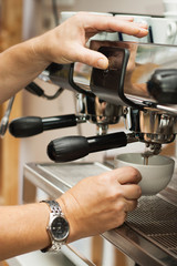 barista prepares coffee