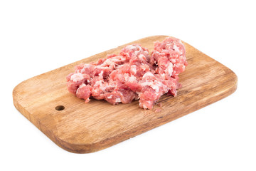 raw burgers on a white background