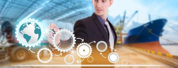 Businessman writing supply chain management logistics with import export background