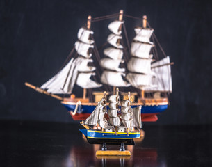 model of a frigate of the 18th century isolated on a black background,
pirate ship model