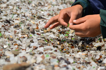 sorting through glass beach 