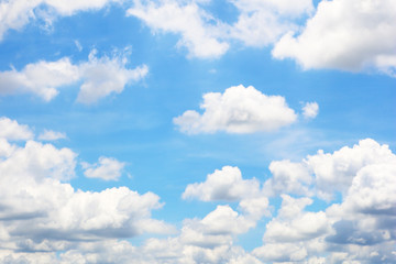 Naklejka na ściany i meble Bright blue sky with white clouds