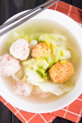 variety of seafood balls and chinese cabbage soup