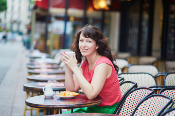 Woman drinking coffee in cafe