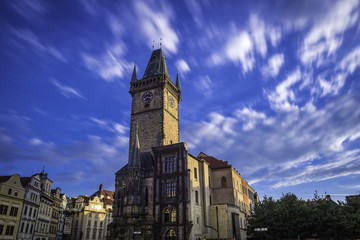 Fototapeta premium Old town tower with astronomical clock. The part which remained after bombing during WWII.