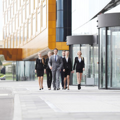 Business people walking outdoors