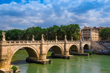 Fototapeta premium Roma, Italy - August, 7, 2016: Bridge Ponte, Sant'Angelo from Tiber in Roma, Italy