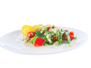 boiled potatoes with tofu, vegetables and almonds in vegan soy cream sauce