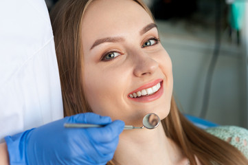 Dentist examining a patient's teeth
