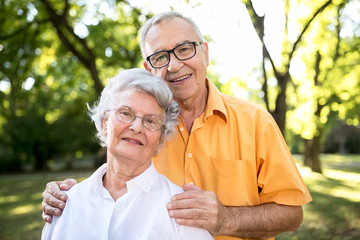 Happy senior couple in park