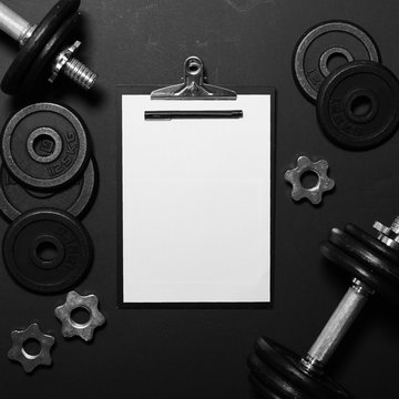 White Paper Board And Exercise Tools - Concept For Workout Plan