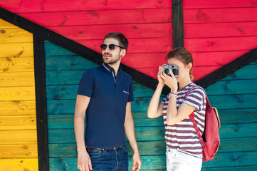 tourists taking a photo while walking in a city02