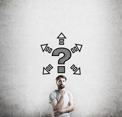 Man in T-shirt and question mark with arrows