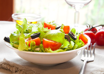 Vegetable salad in a white plate