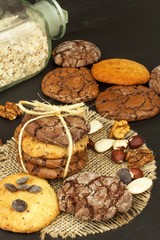 Mixed Cookies on wooden table. Homemade biscuits for breakfast. Food preparation.
