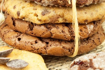 Mixed Cookies on wooden table. Homemade biscuits for breakfast. Food preparation.
