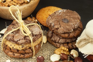 Mixed Cookies on wooden table. Homemade biscuits for breakfast. Food preparation.
