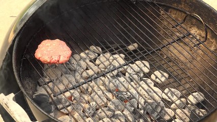 Flipping Hamburgers on a Charcoal Grill, 4K 100MBPS
