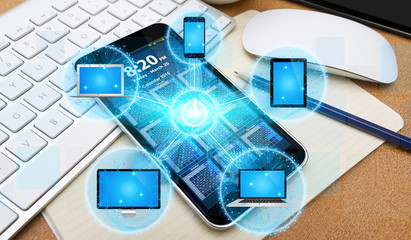 Tech devices connected to each other by mobile phone