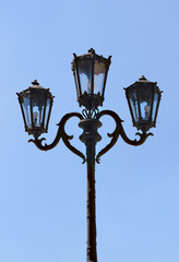 Fototapeta na wymiar Antique Lamppost Lantern on a sky background