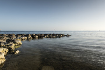 Sunset at tropical sea coast.