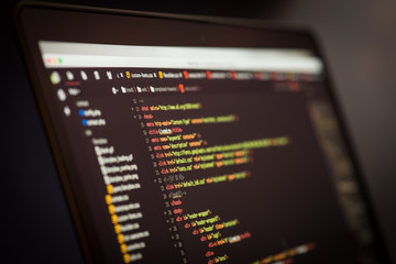 HTML and CSS code developing screenshot. Laptop screen.