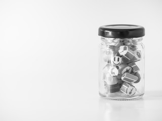 Black and white tone. You can see smiley face candy cane in glass jar.