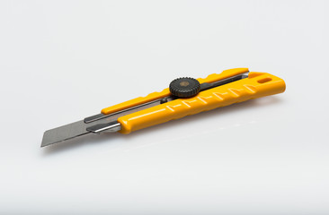 Yellow Cutter isolated on white background