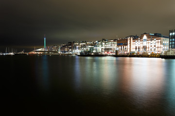 Obraz premium Aker brygge neighbourhood in Oslo, Norway at night
