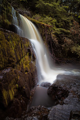 Huge ledged waterfall on the Mellte river, near Pontneddfechan in South Wales, UK.