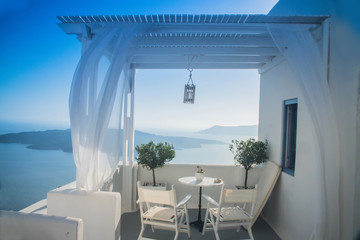white table in outdoor restaurant in Greece, Santorini